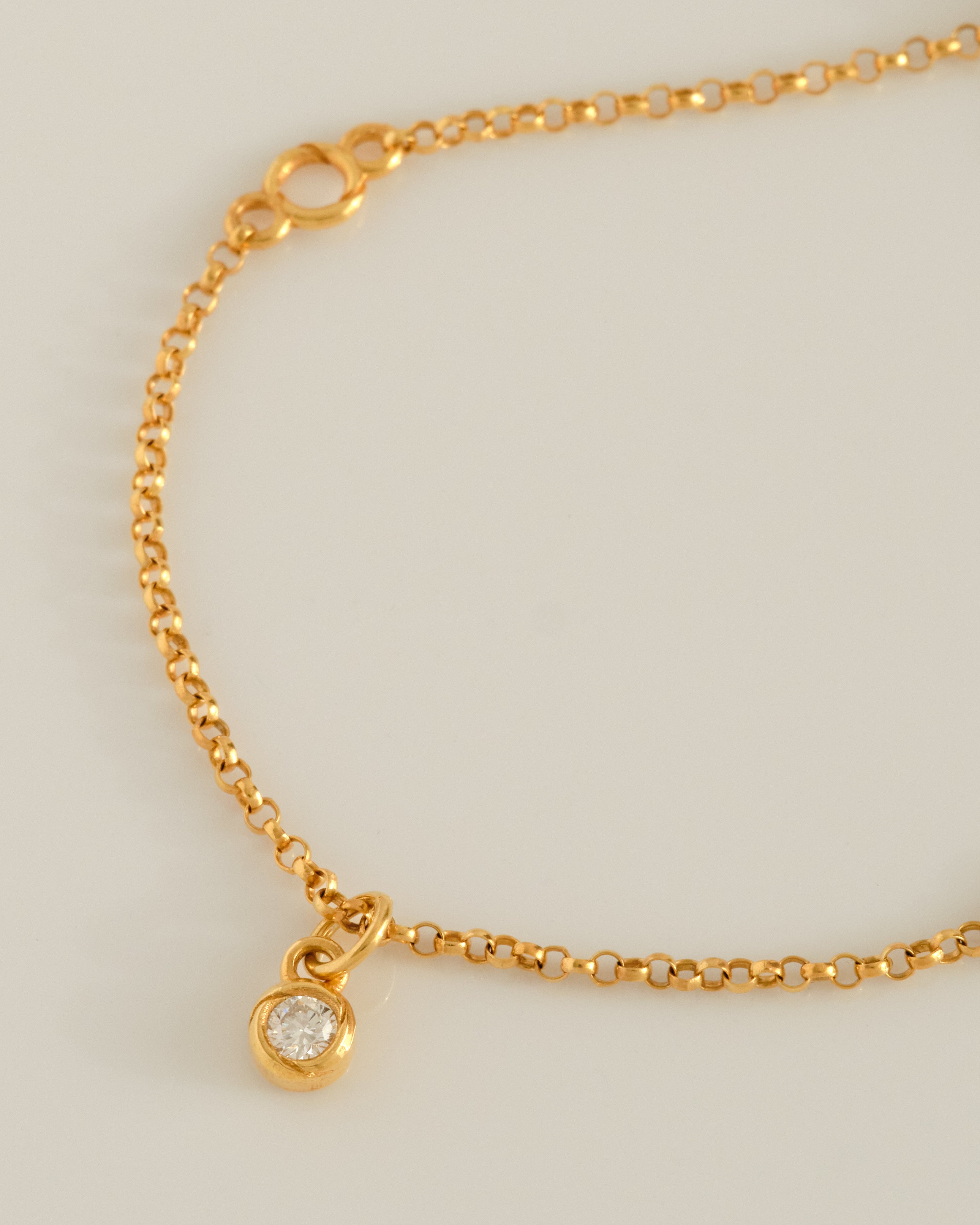 Close-up of the Eternal Grace floating lab grown diamond pendant on a 14k gold vermeil Italian-made chain.